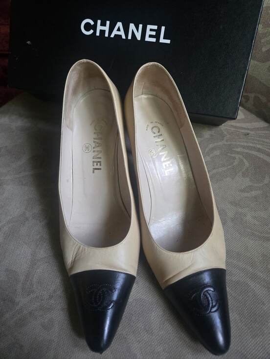 CHANEL Shoes - CHANEL Chic Two-Tone Beige and Black Cap-Toe Leather Pumps